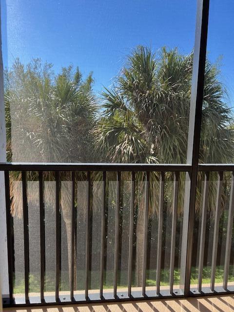 1605 Highway 1, Unit F305 Jupiter, FL 33477 - Photo 28 of 31 a balcony with wooden floor