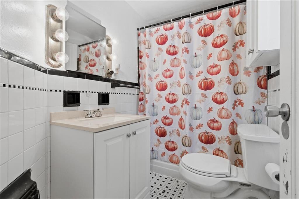 312 Friday Road Pittsburgh, PA 15209 - Photo 23 of 43 a bathroom with a sink toilet and shower