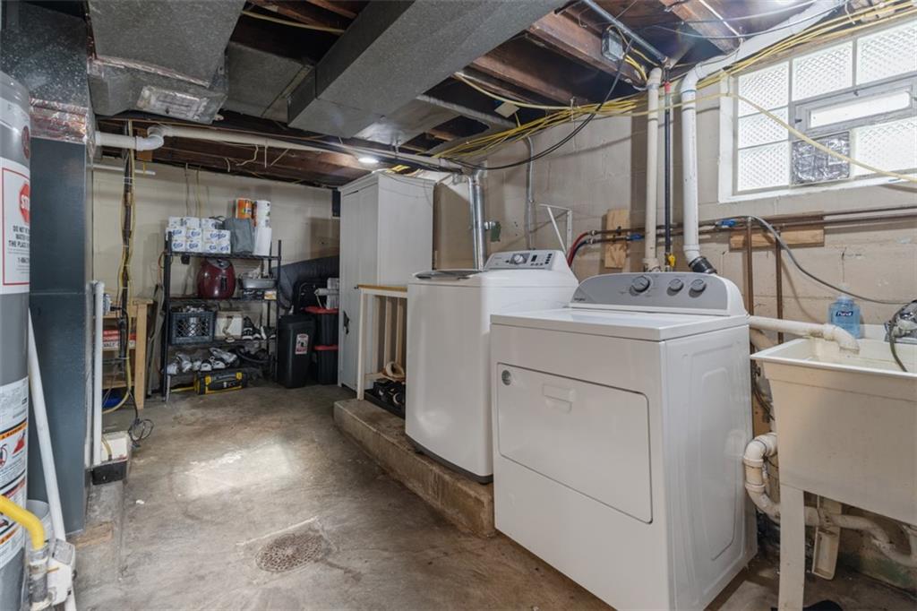 312 Friday Road Pittsburgh, PA 15209 - Photo 35 of 43 a utility room with dryer and washer