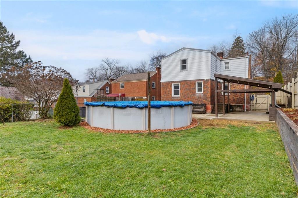 312 Friday Road Pittsburgh, PA 15209 - Photo 40 of 43 a front view of house with yard and garage