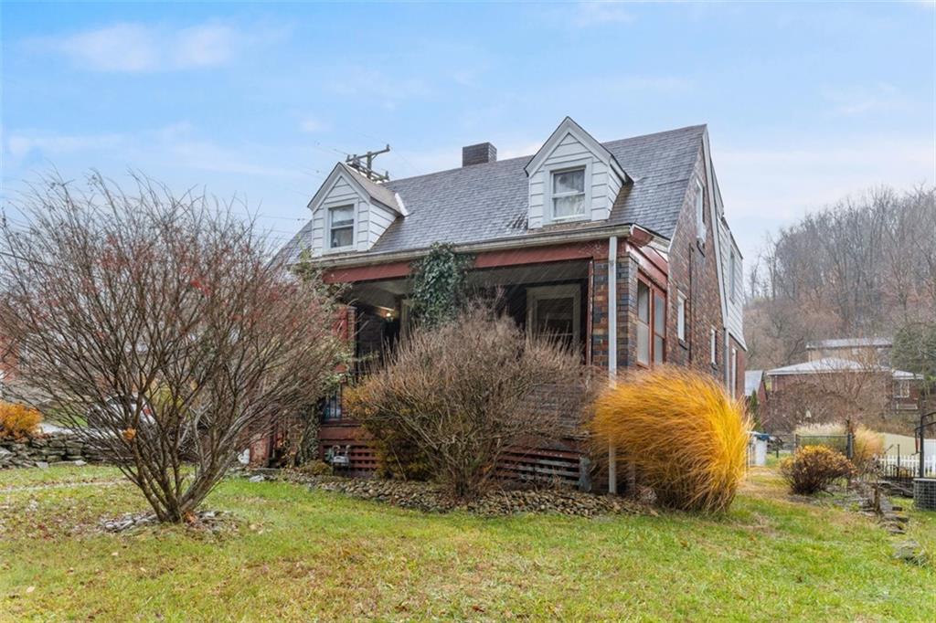 312 Friday Road Pittsburgh, PA 15209 - Photo 4 of 43 a view of a house with a yard
