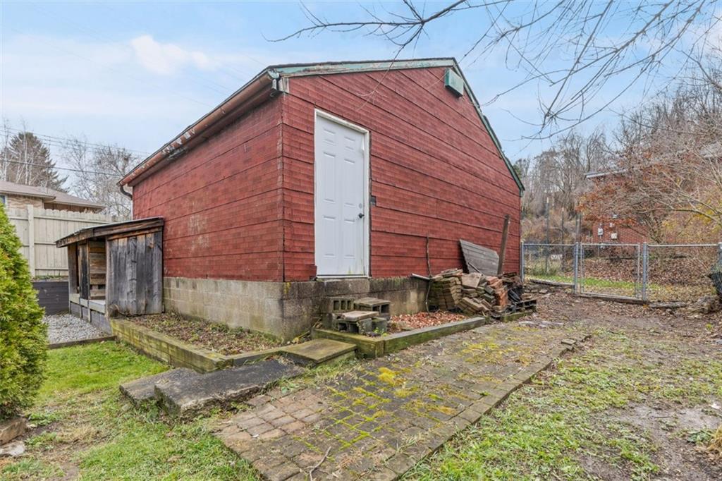 312 Friday Road Pittsburgh, PA 15209 - Photo 43 of 43 a backyard of a house with yard and outdoor seating