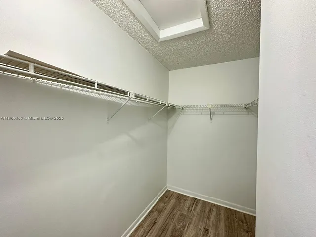 a view of a room with racks on the wall