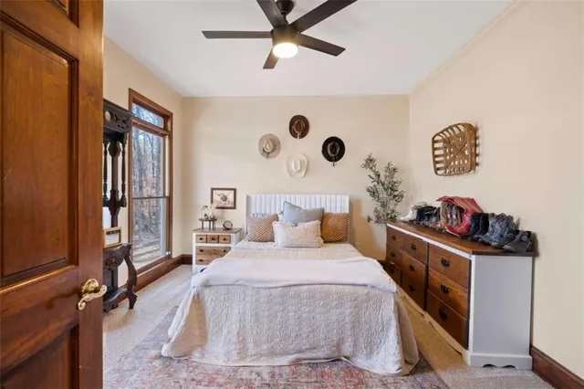 a bathroom with a sink vanity mirror and toilet