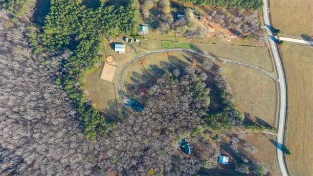 an aerial view of residential house with outdoor space