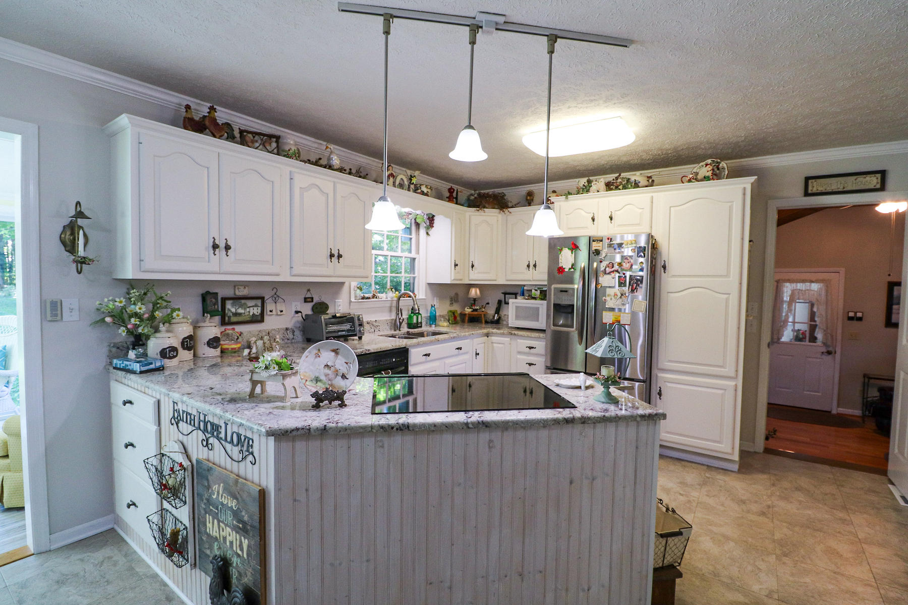645 Long Level Road Southwest Floyd, VA 24091 - Photo 8 of 22 a kitchen with refrigerator and cabinets