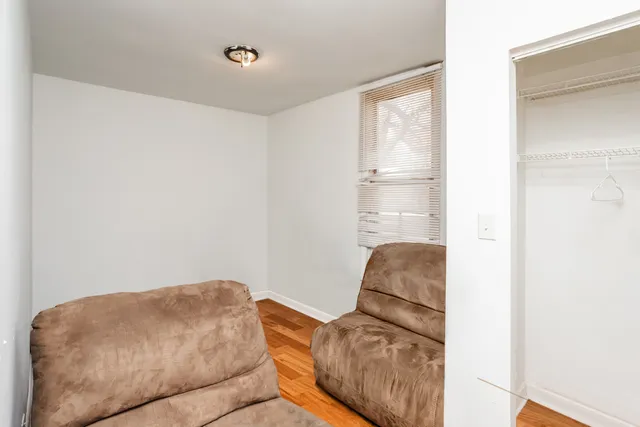 a room with a couch and a window