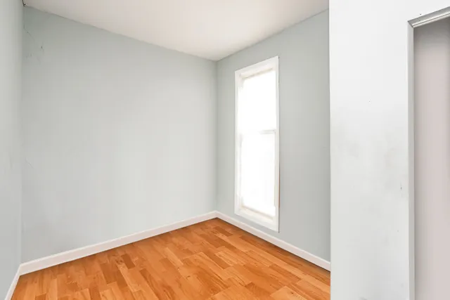 a view of an empty room and window