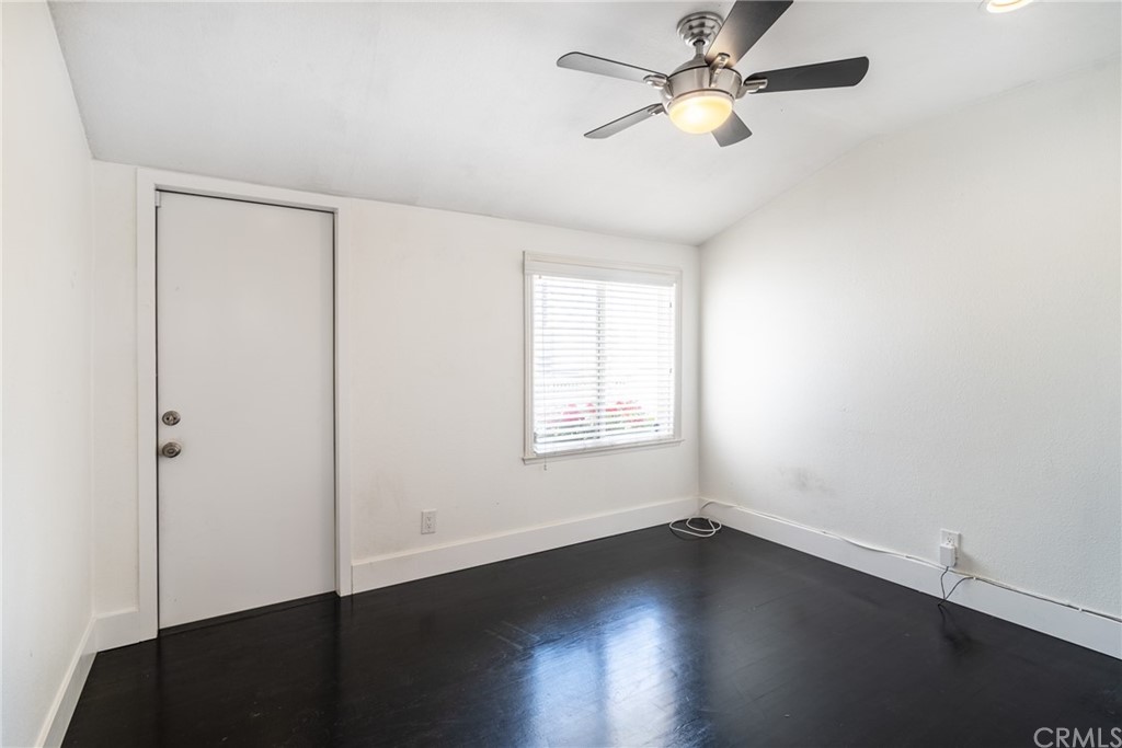 5352 Edinger Avenue Huntington Beach, CA 92649 - Photo 15 of 42 Bedroom 1 with garage access