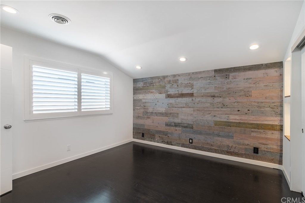 5352 Edinger Avenue Huntington Beach, CA 92649 - Photo 21 of 42 Primary Bedroom with Driftwood wall feature