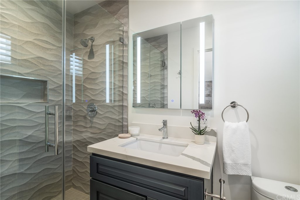 5352 Edinger Avenue Huntington Beach, CA 92649 - Photo 23 of 42 Primary Full Walk-in Shower