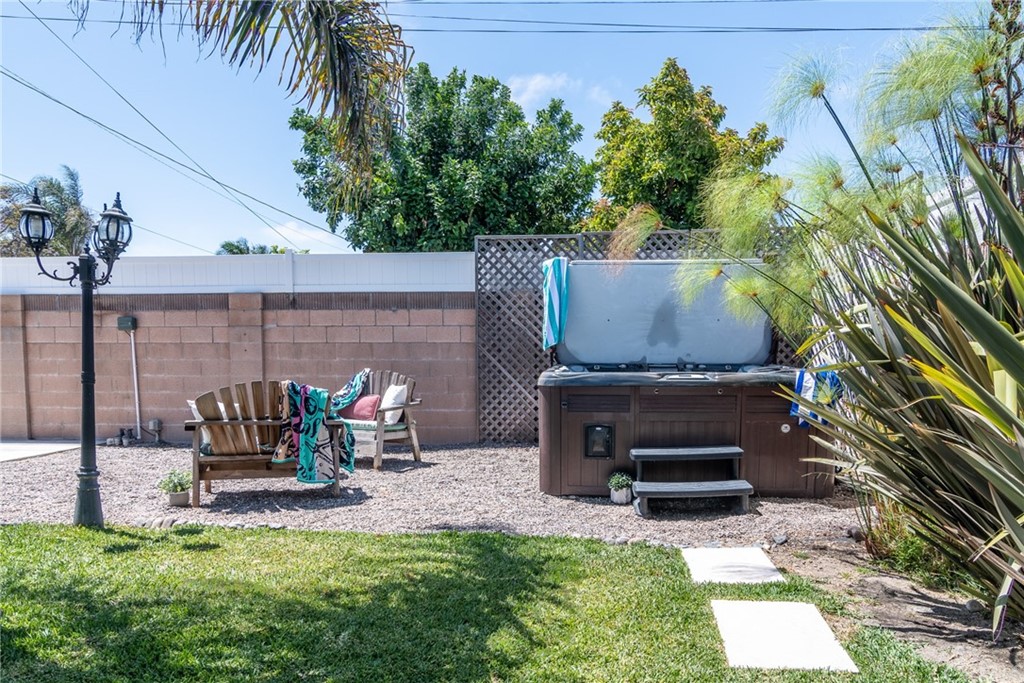 5352 Edinger Avenue Huntington Beach, CA 92649 - Photo 31 of 42 Side Yard View with a secure dog door access into the garage