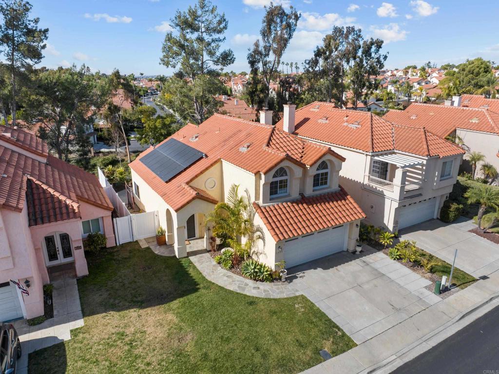 1453 Genoa Drive Vista, CA 92081 - Photo 27 of 32 an aerial view of a house with a garden and trees