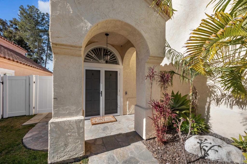 1453 Genoa Drive Vista, CA 92081 - Photo 3 of 32 a view of a house with a patio