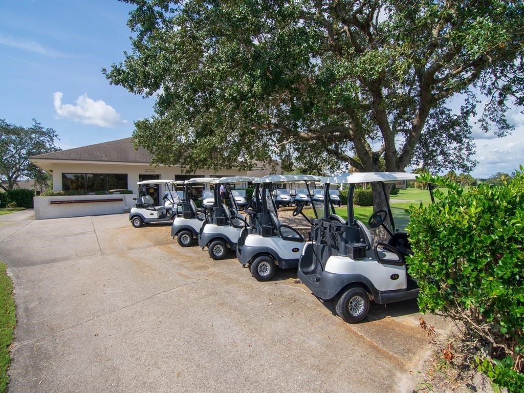 27 Plantation Drive, Unit 202 Vero Beach, FL 32966 - Photo 20 of 30 an outdoor space with patio