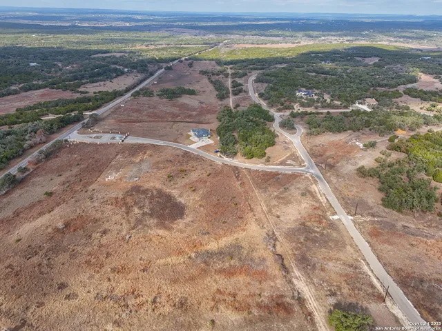 a view of a road with an ocean view