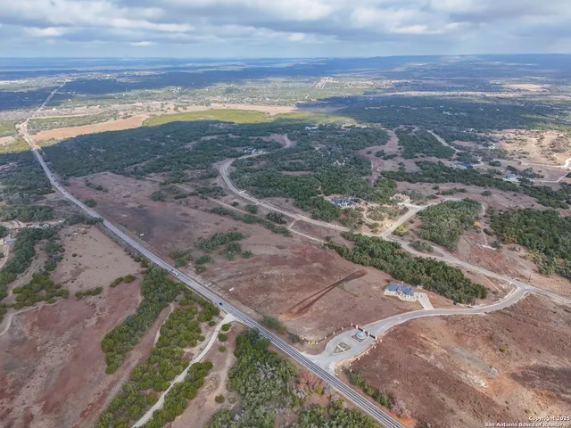 a view of a city with lots of trees