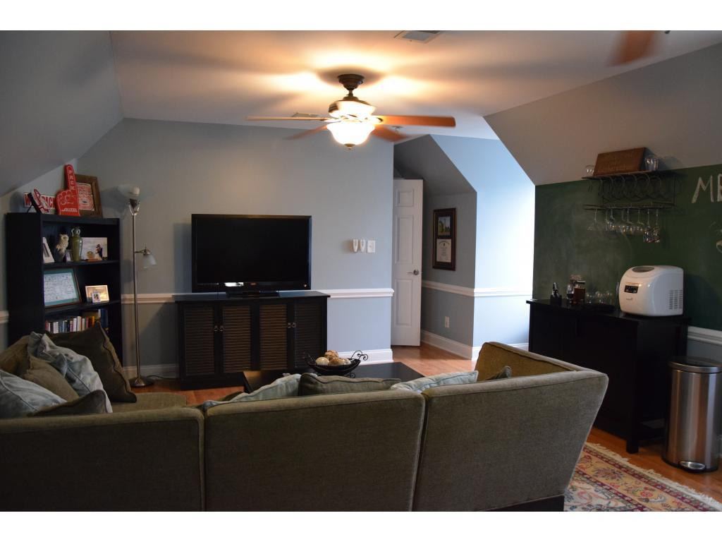 1817 Eric Graham, NC 27253 - Photo 14 of 24 a living room with furniture and a flat screen tv
