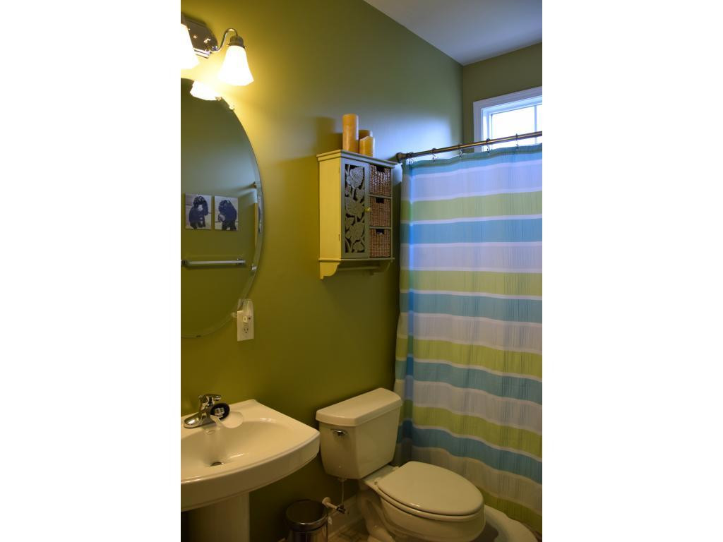 1817 Eric Graham, NC 27253 - Photo 20 of 24 a bathroom with a sink toilet and shower