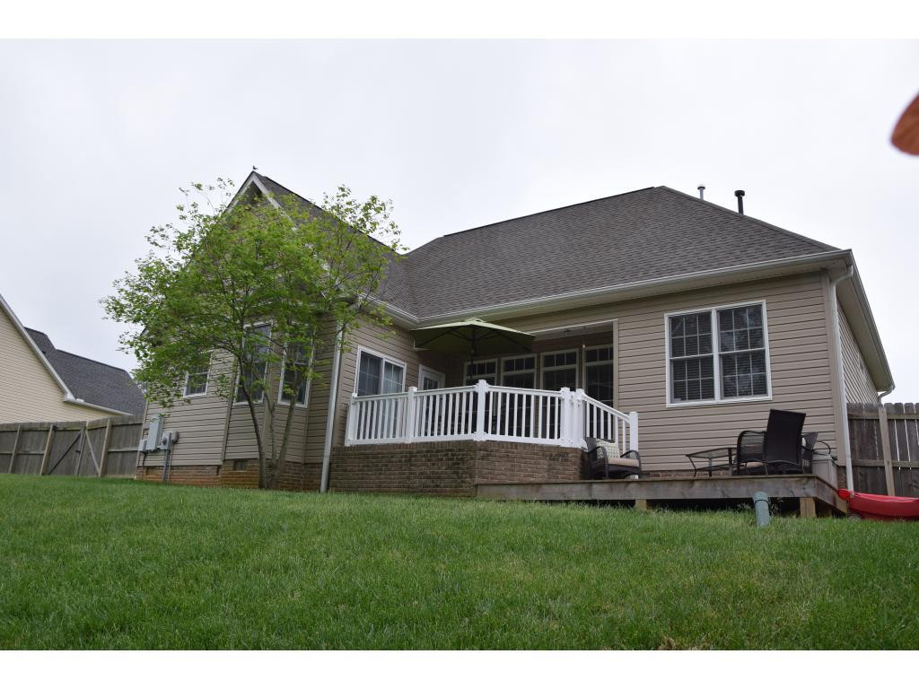 1817 Eric Graham, NC 27253 - Photo 2 of 24 a house view with a garden space