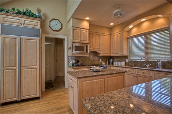 4 Coppersmyth Way, Unit 4 Lexington, MA 02421 - Photo 2 of 28 a kitchen with stainless steel appliances granite countertop a stove a sink dishwasher and a refrigerator with wooden floor