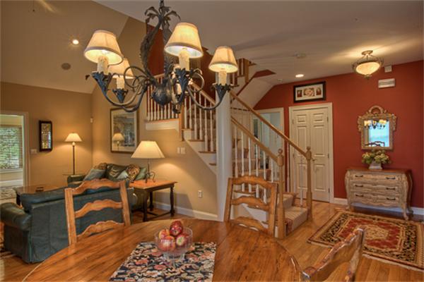 4 Coppersmyth Way, Unit 4 Lexington, MA 02421 - Photo 7 of 28 a view of a livingroom with furniture and staircase