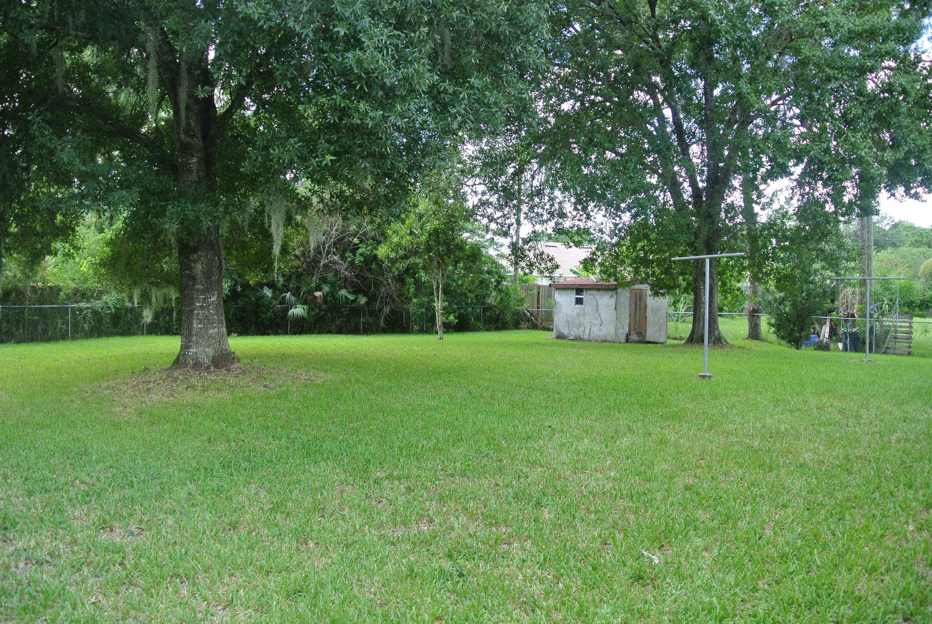 285 Abalone Road Northwest Palm Bay, FL 32907 - Photo 14 of 15 Backyard