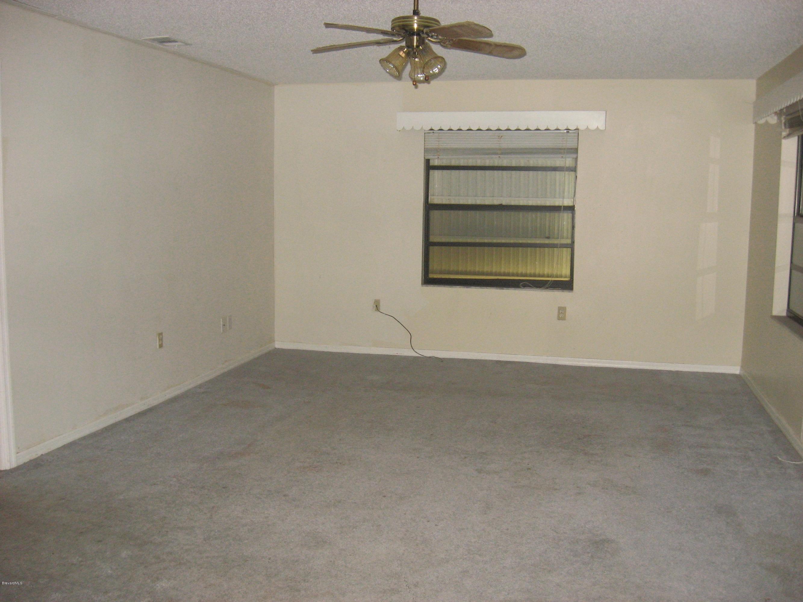 285 Abalone Road Northwest Palm Bay, FL 32907 - Photo 5 of 15 Family room