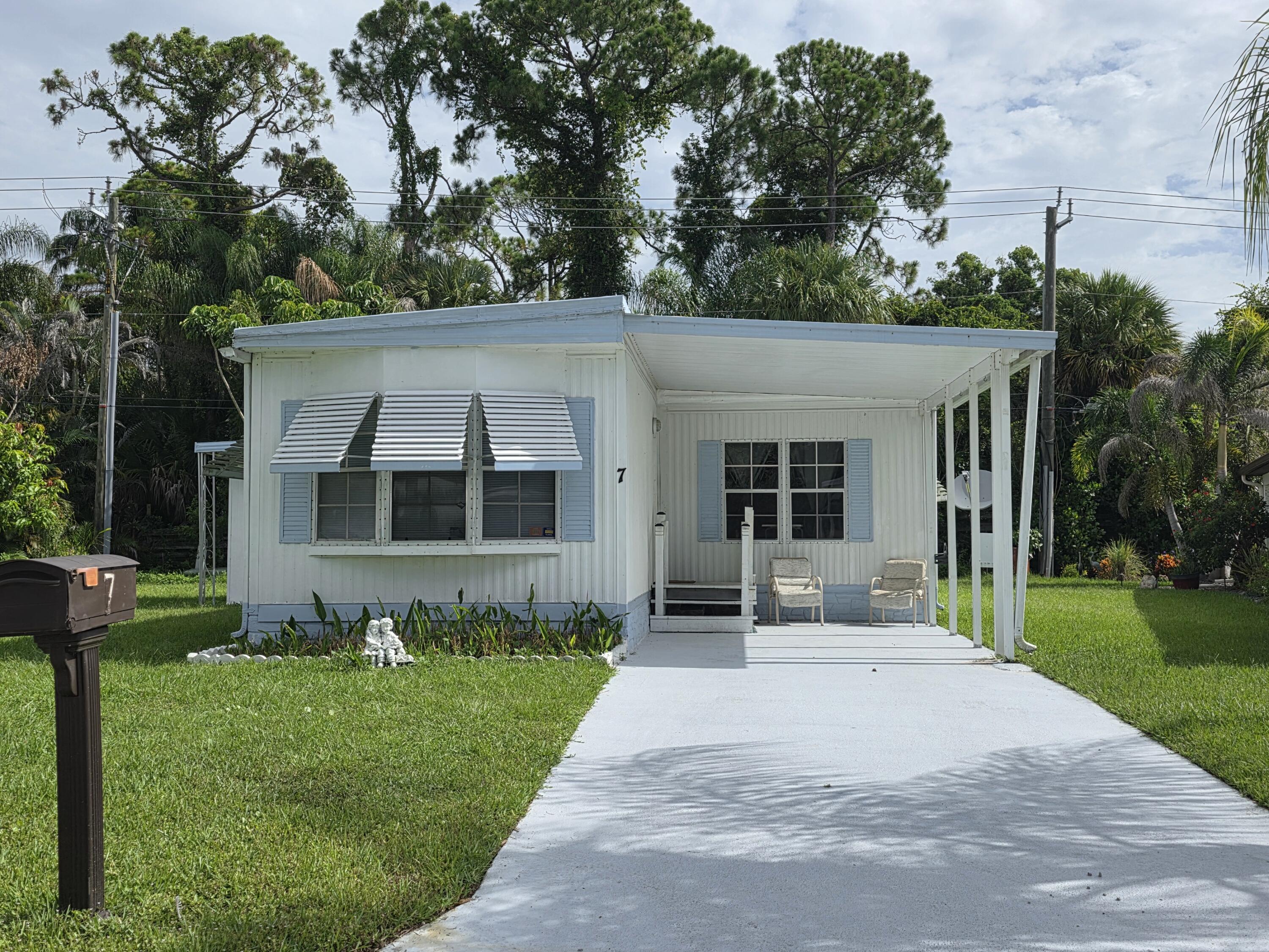7 Quintana Roo Lane Port St. Lucie, FL 34952 - Photo 1 of 14 20260713_100739