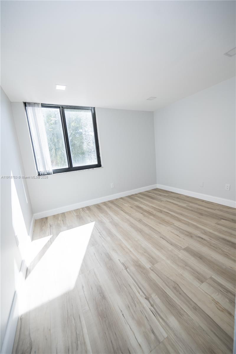 755 Dotterel Road, Unit 1301 Delray Beach, FL 33444 - Photo 12 of 15 wooden floor in a room