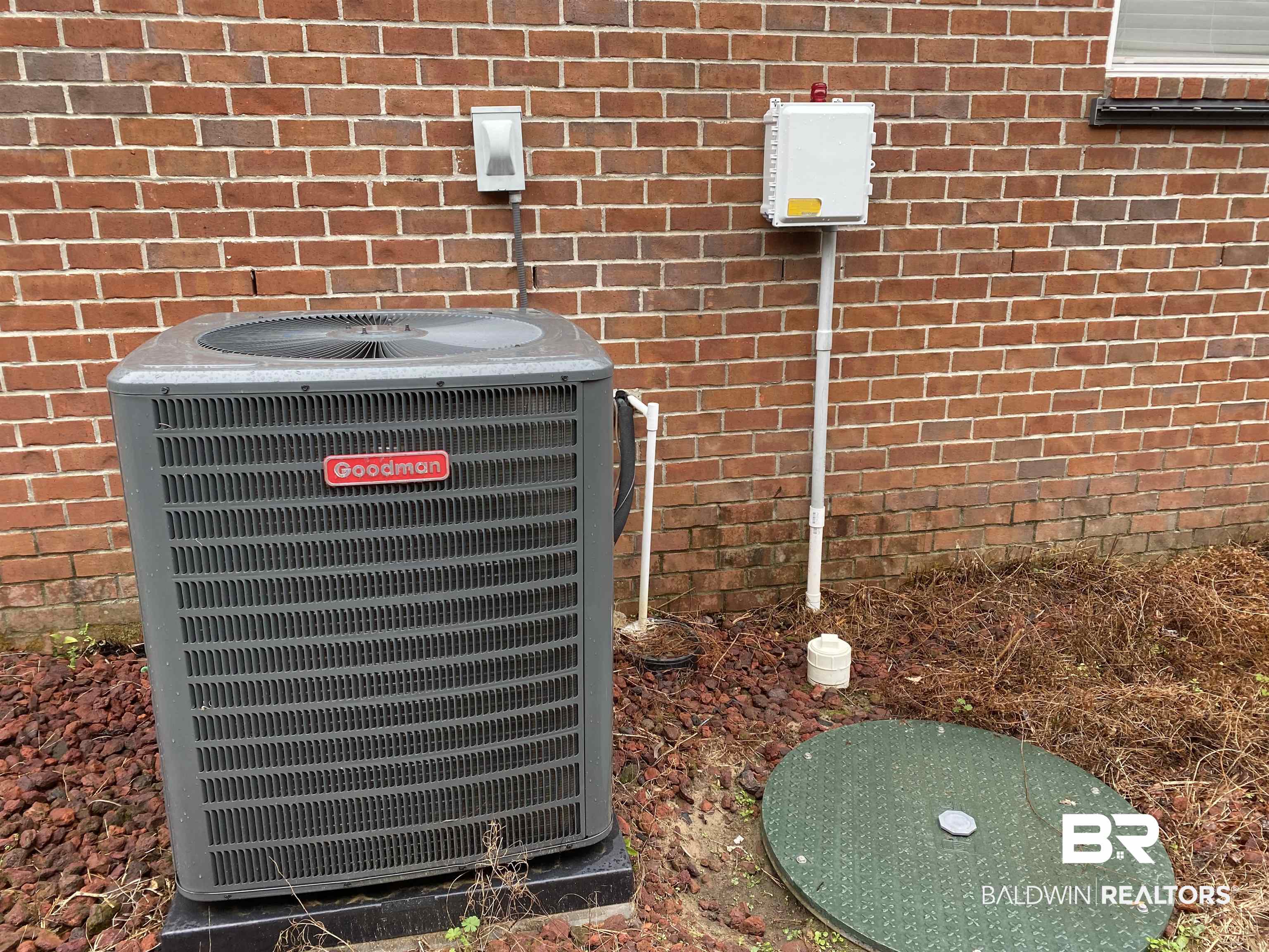 7742 Avery Lane Daphne, AL 36526 - Photo 6 of 41 2019 A/C 2022 Grinder pump, control panel & Lid