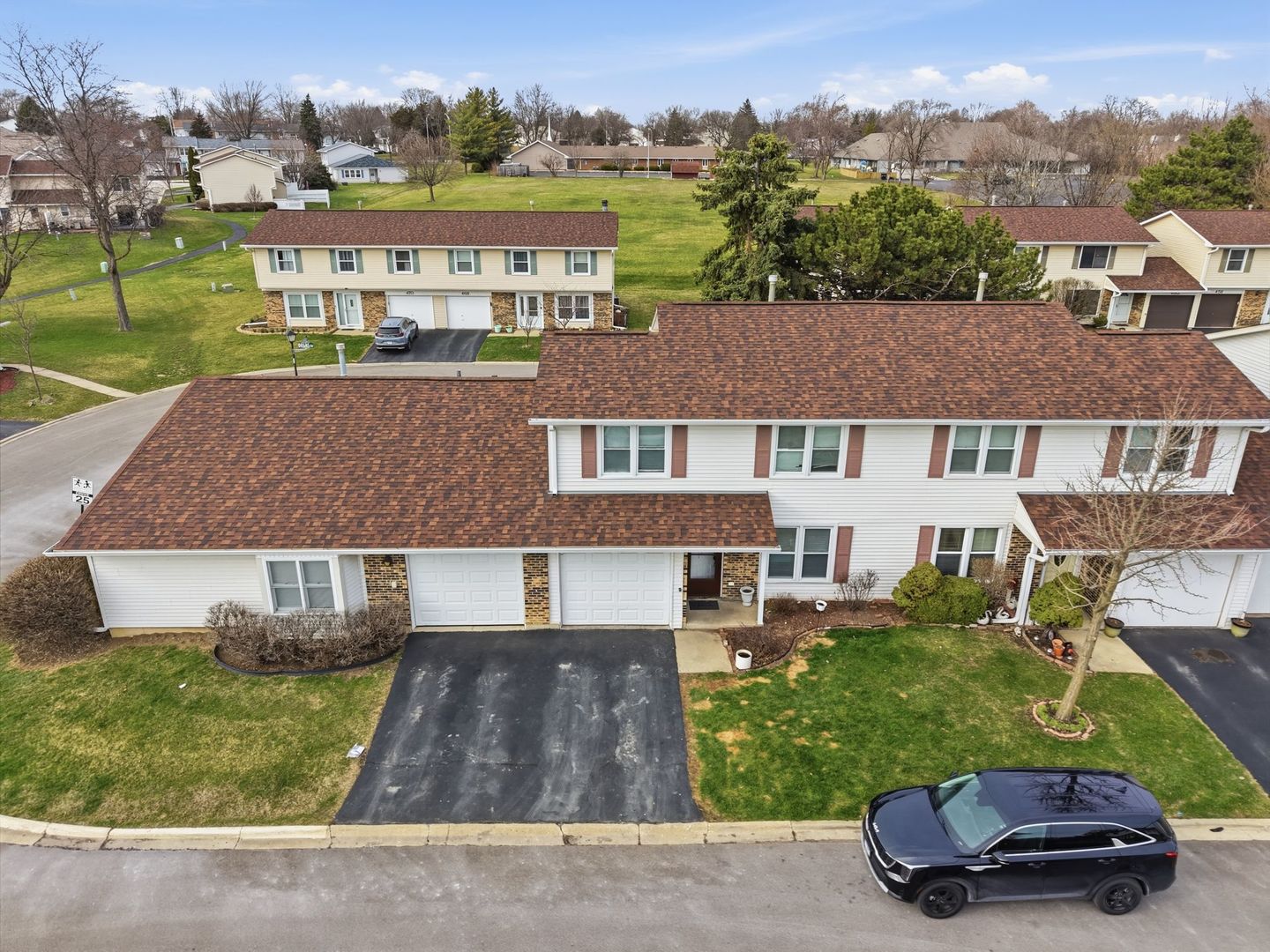 458 Wyeth Court Bolingbrook, IL 60440 - Photo 12 of 17 an aerial view of a house with a garden and lake view