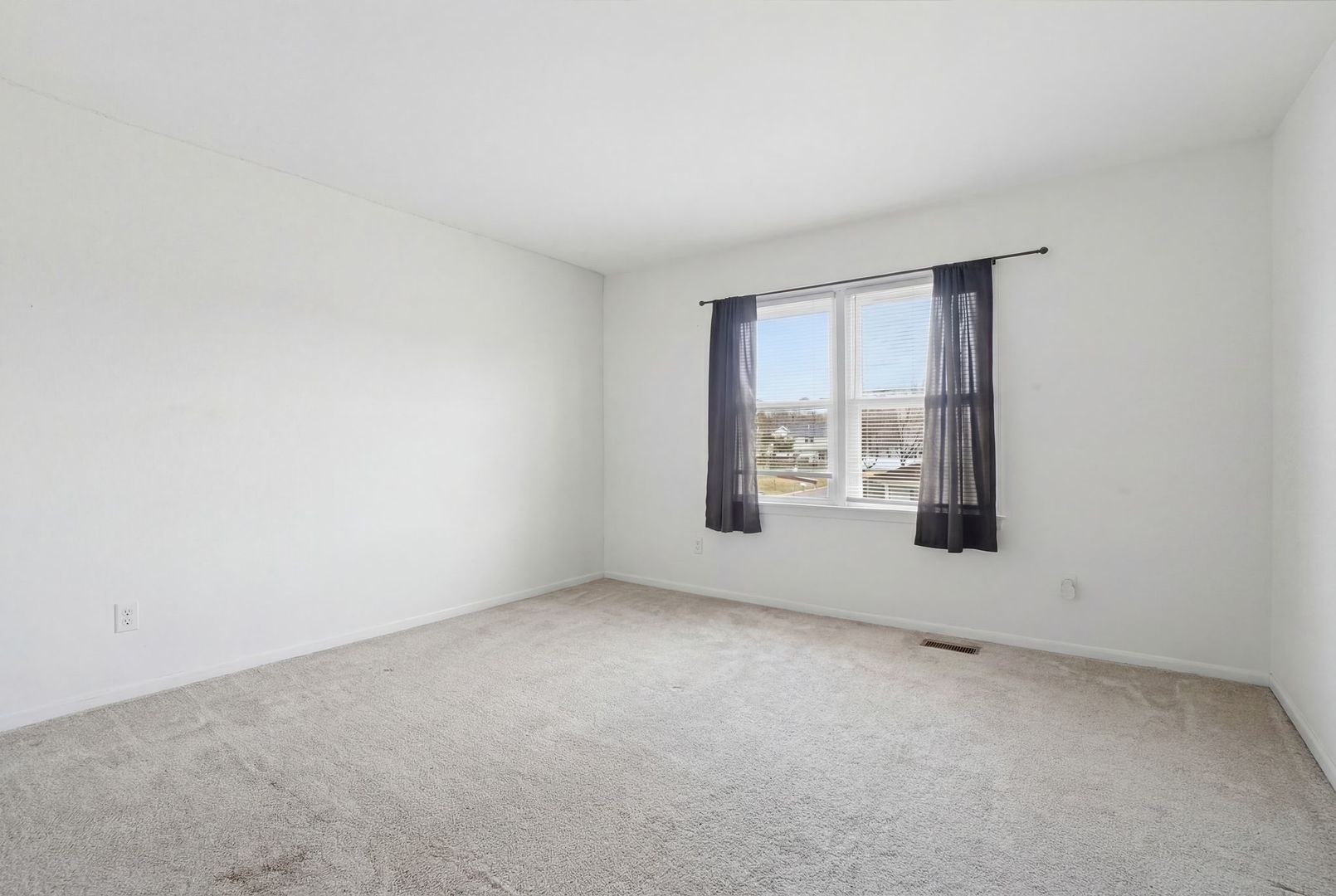 458 Wyeth Court Bolingbrook, IL 60440 - Photo 7 of 17 an empty room with windows