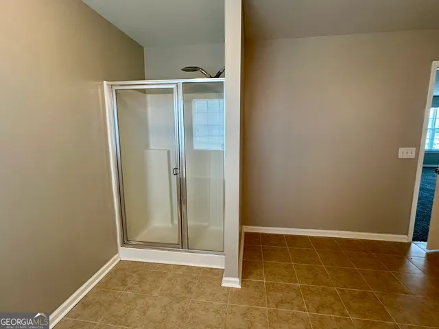 a view of a backyard of the house