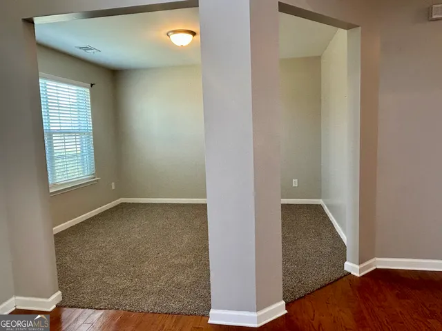 an empty room with a window