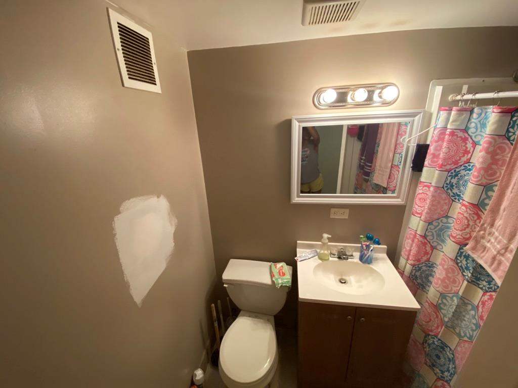 34 Columbus Avenue, Unit B20 Spring Valley, NY 10977 - Photo 2 of 10 Full bath with vanity and a shower with shower curtain