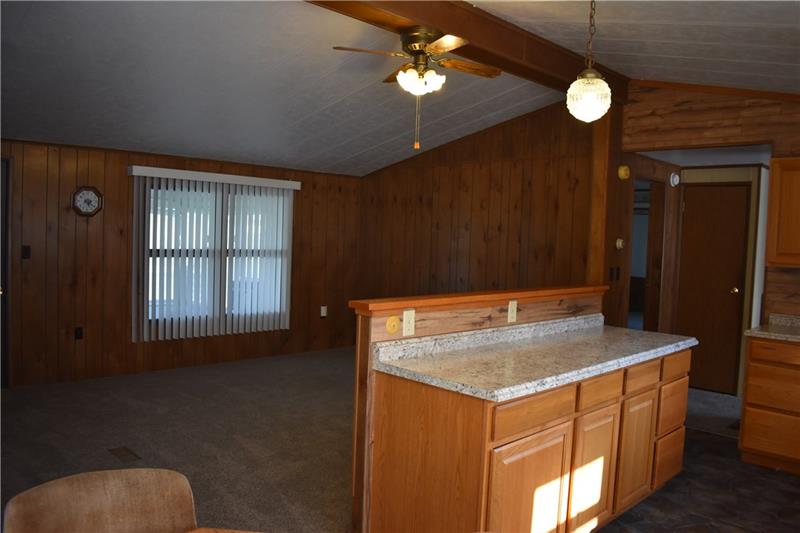 105 Bell Way Derry, PA 15627 - Photo 21 of 24 View From Dining Room Into Living Room, Note The Cathedral Ceiling