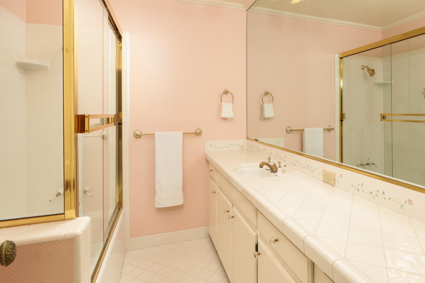47 Bay Tree Lane Los Altos, CA 94022 - Photo 20 of 34 a bathroom with a tub sink and a mirror