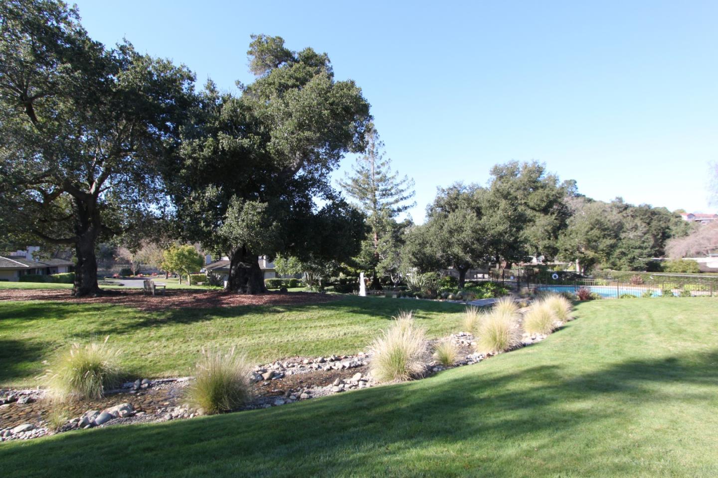 47 Bay Tree Lane Los Altos, CA 94022 - Photo 31 of 34 a view of a lake with houses