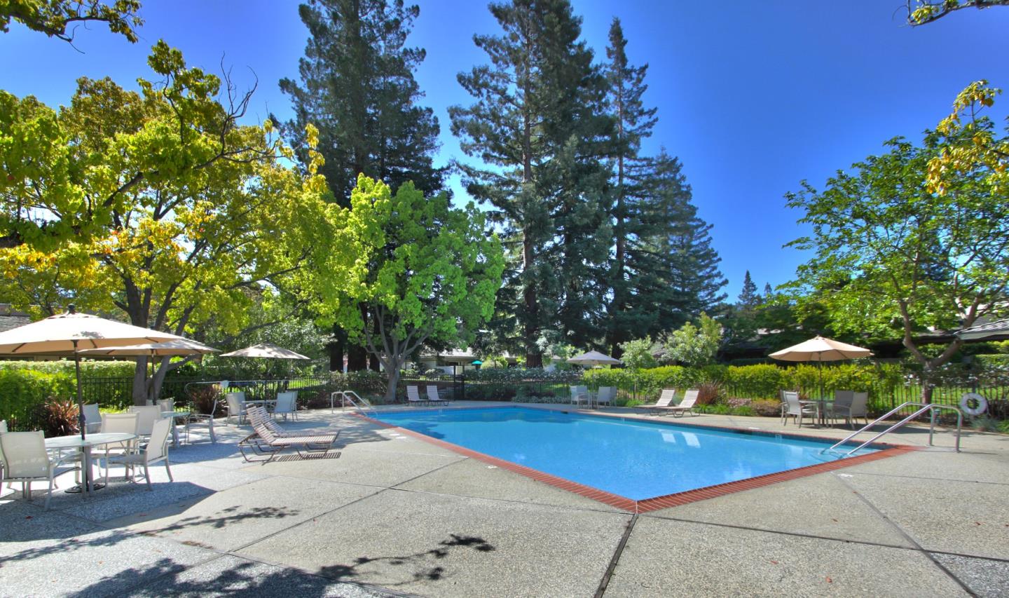 47 Bay Tree Lane Los Altos, CA 94022 - Photo 33 of 34 a view of a swimming pool with an outdoor seating