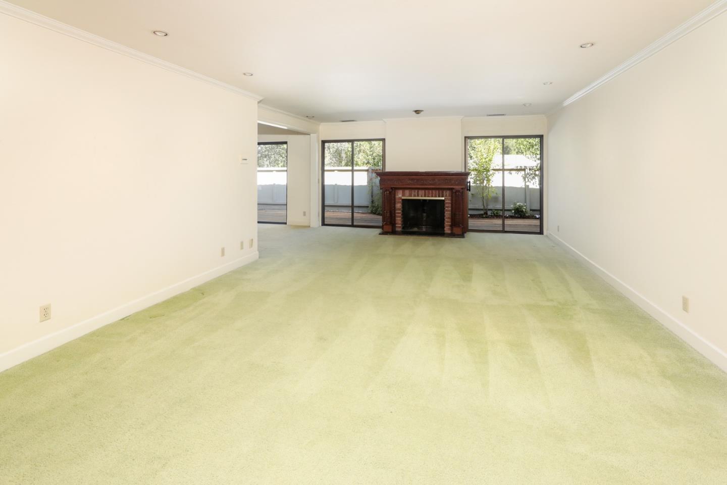 47 Bay Tree Lane Los Altos, CA 94022 - Photo 10 of 34 a view of empty room with fireplace