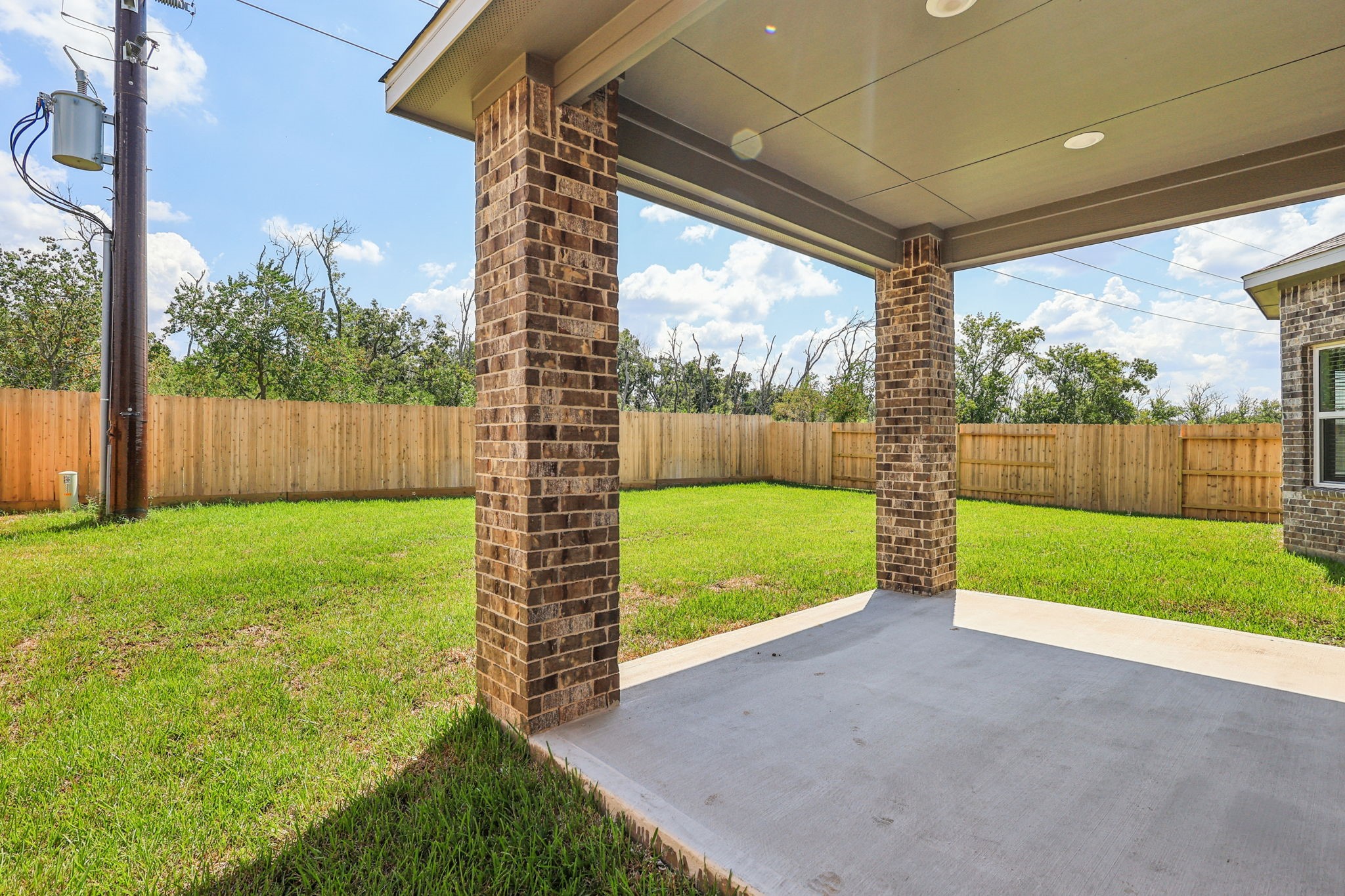 5223 Kingdom Heights Boulevard Rosenberg, TX 77471 - Photo 36 of 41 a view of backyard with a small garden and plants