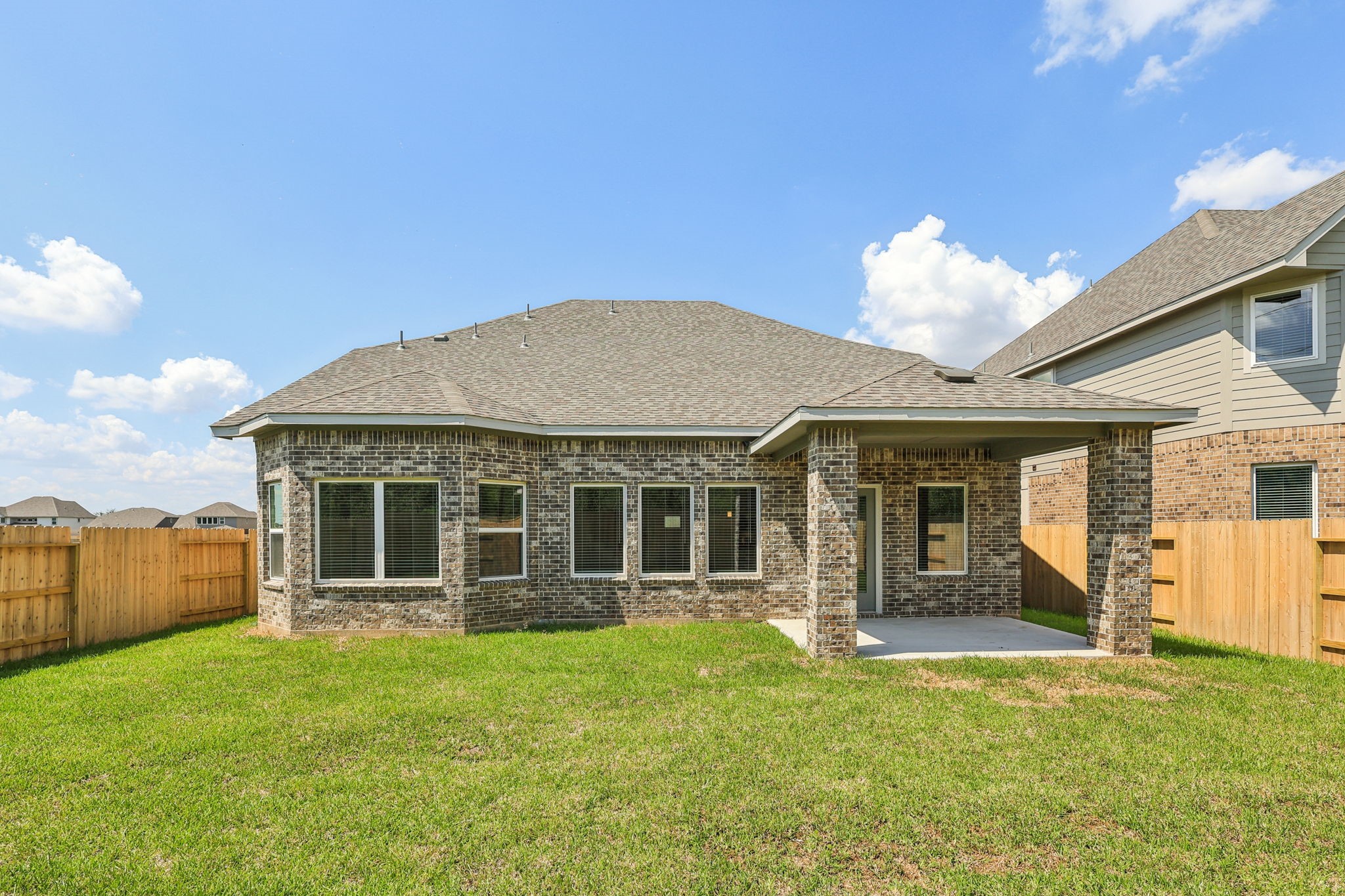 5223 Kingdom Heights Boulevard Rosenberg, TX 77471 - Photo 38 of 41 a view of a house with garden and porch