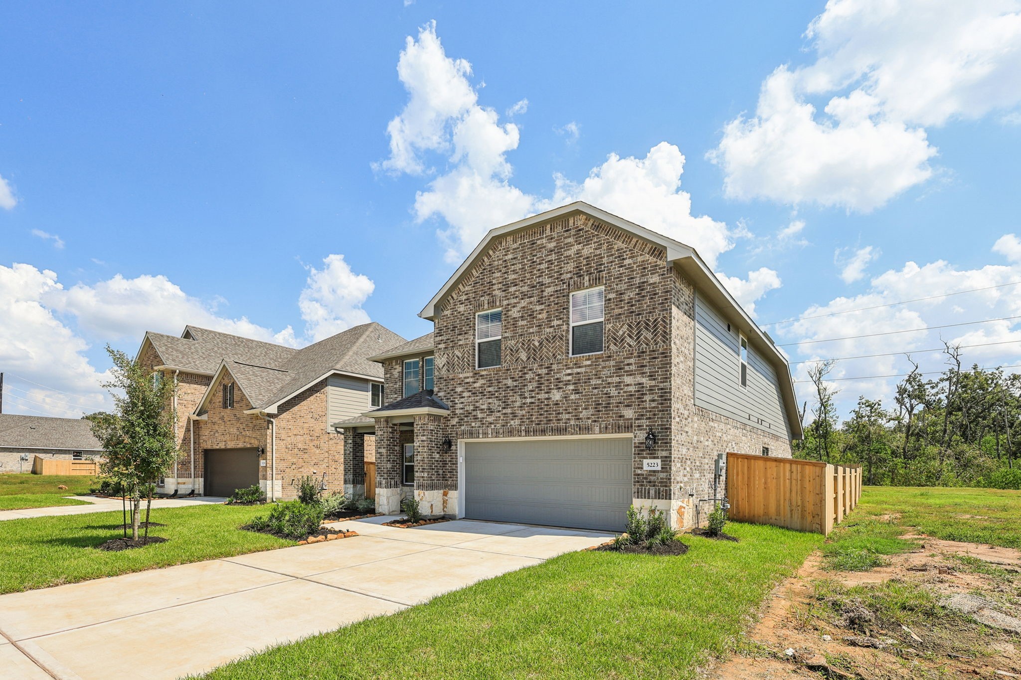 5223 Kingdom Heights Boulevard Rosenberg, TX 77471 - Photo 40 of 41 a view of a house with a yard