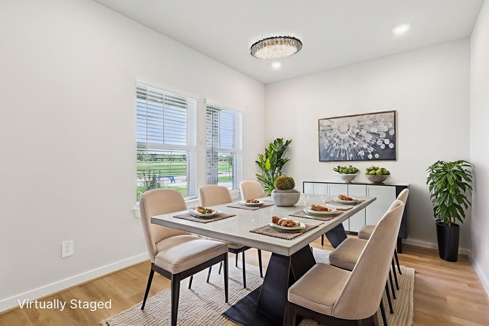 5223 Kingdom Heights Boulevard Rosenberg, TX 77471 - Photo 5 of 41 a view of a dining room with furniture window and wooden floor