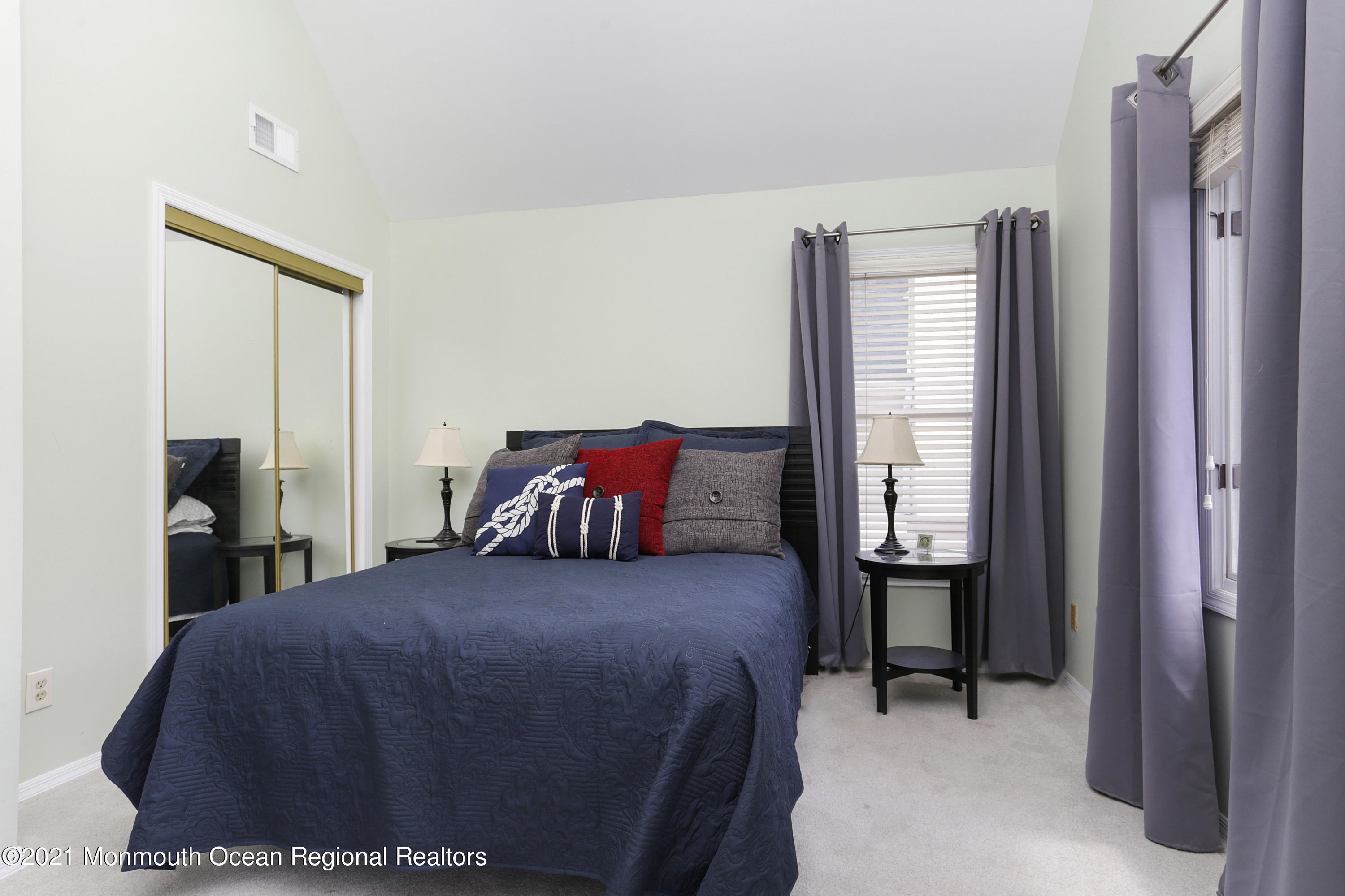 100 1st Street, Unit 11 Keyport, NJ 07735 - Photo 12 of 29 a bedroom with a bed and a window