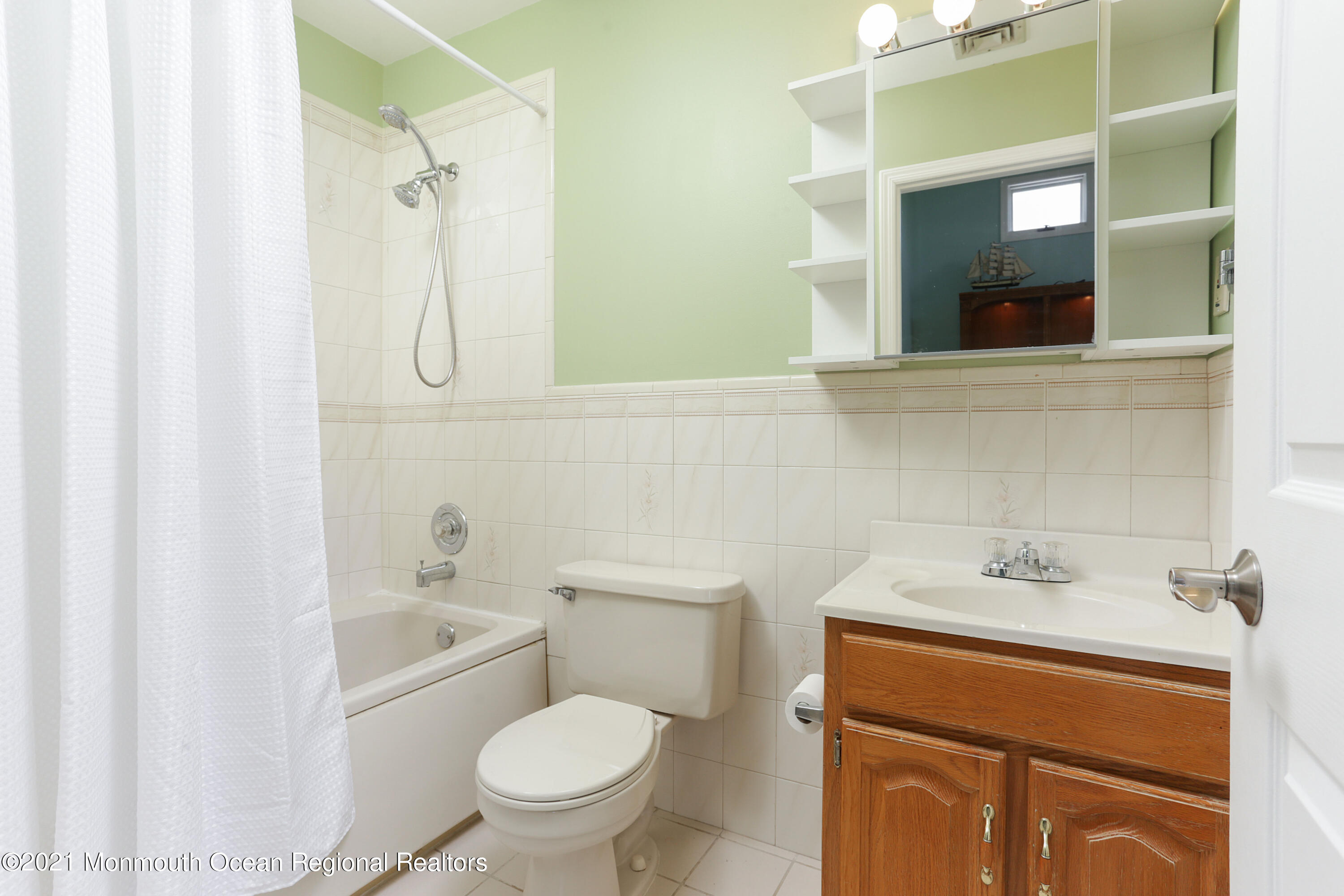 100 1st Street, Unit 11 Keyport, NJ 07735 - Photo 13 of 29 a bathroom with a sink a toilet and shower