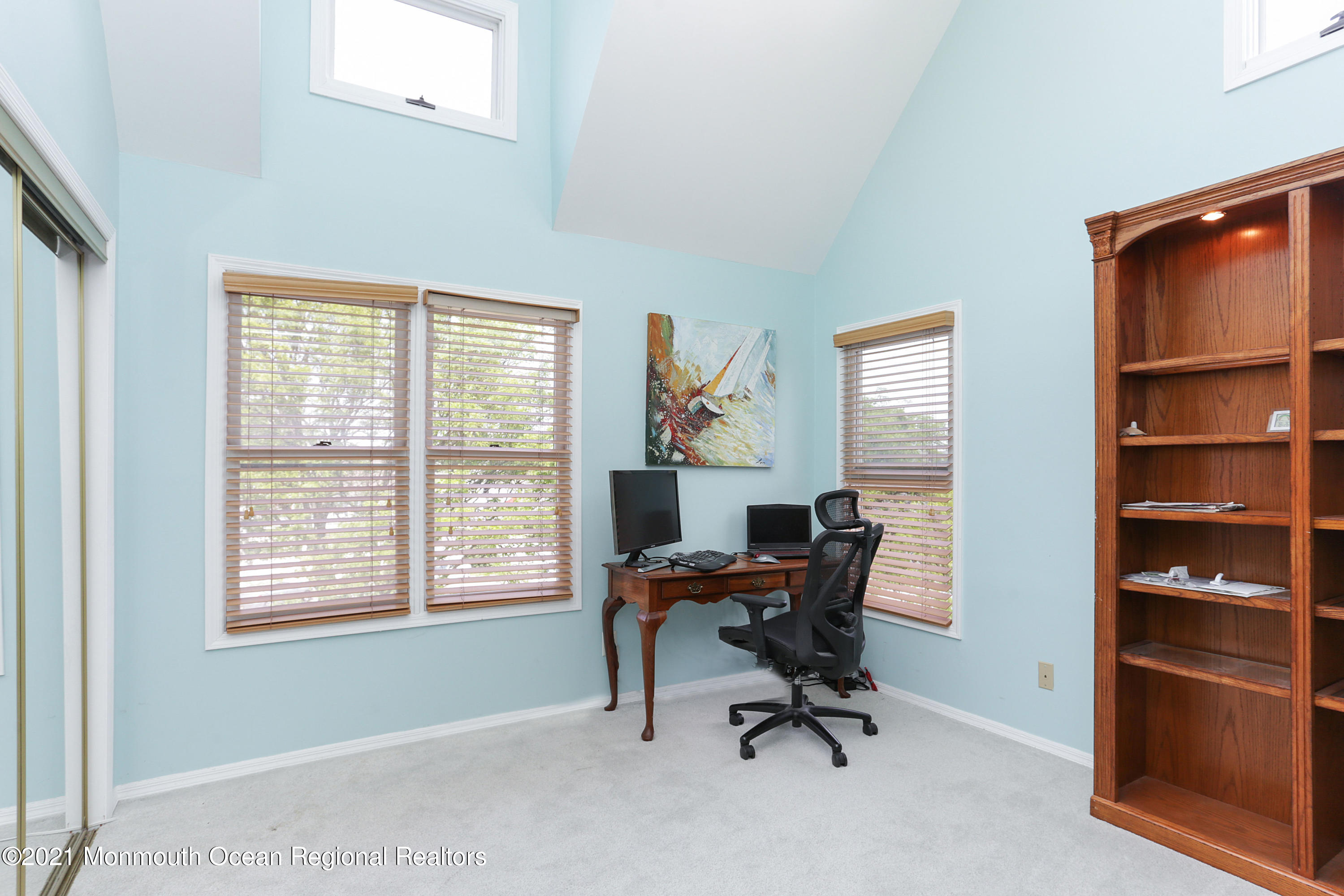 100 1st Street, Unit 11 Keyport, NJ 07735 - Photo 14 of 29 a view of a workspace with furniture and a window