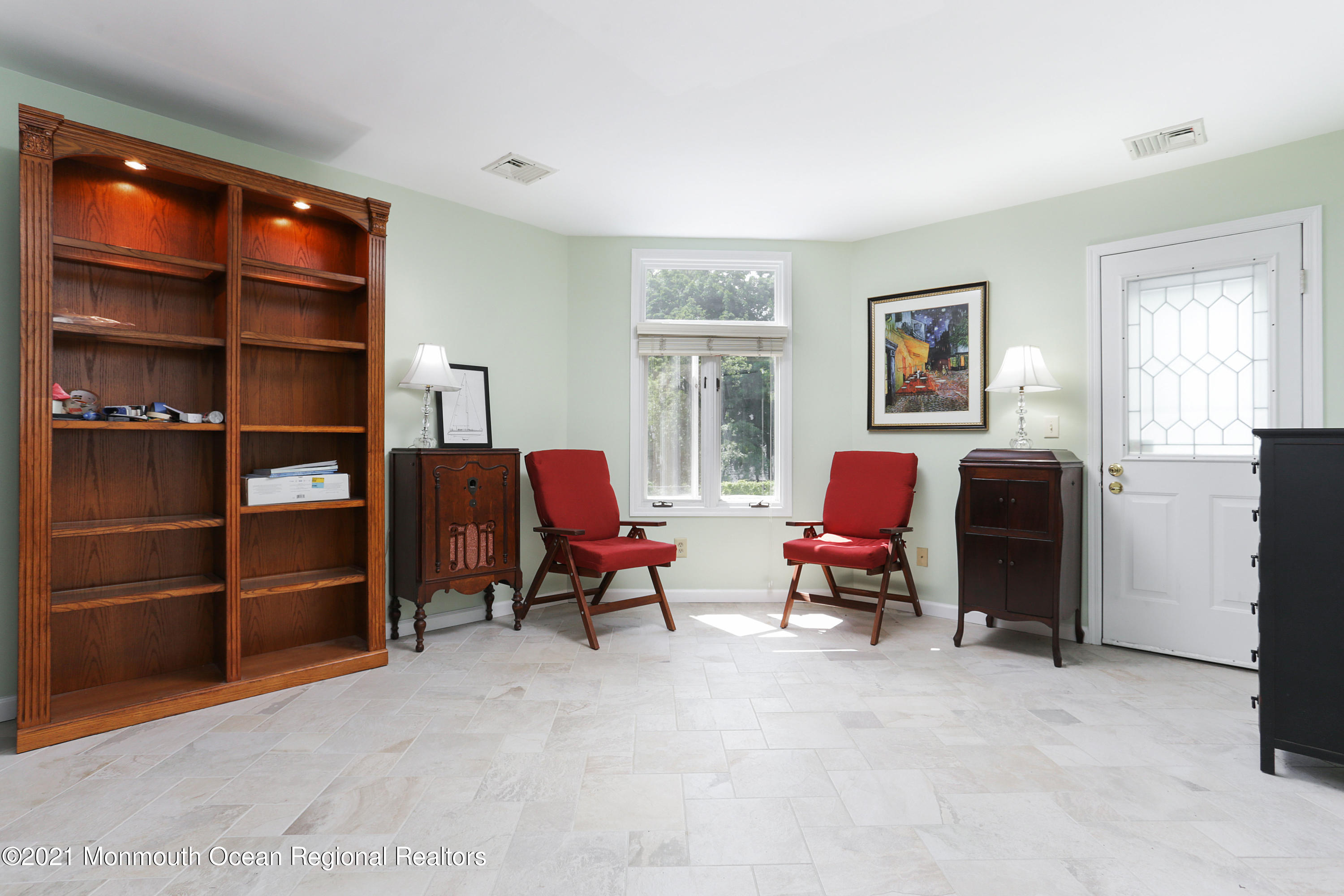 100 1st Street, Unit 11 Keyport, NJ 07735 - Photo 16 of 29 a view of a livingroom with workspace and a window