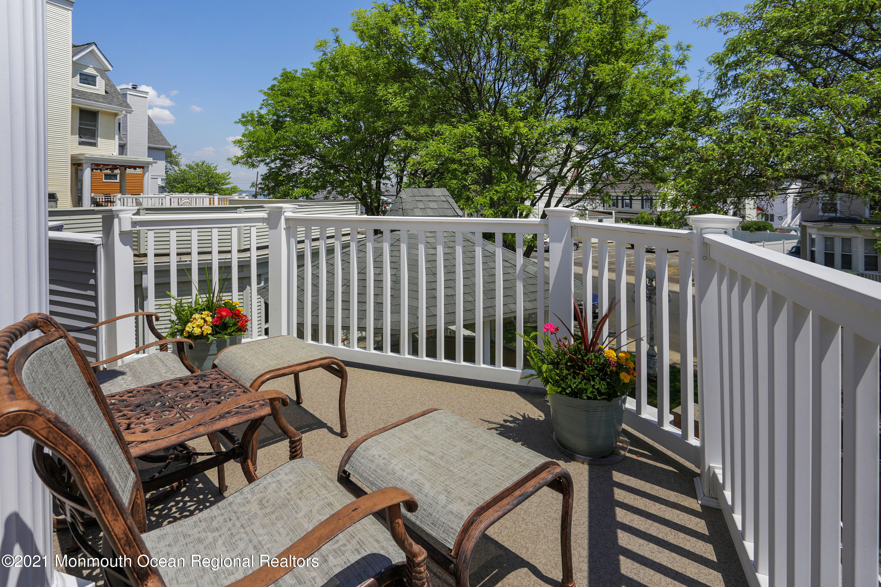 100 1st Street, Unit 11 Keyport, NJ 07735 - Photo 3 of 29 a view of a balcony with furniture